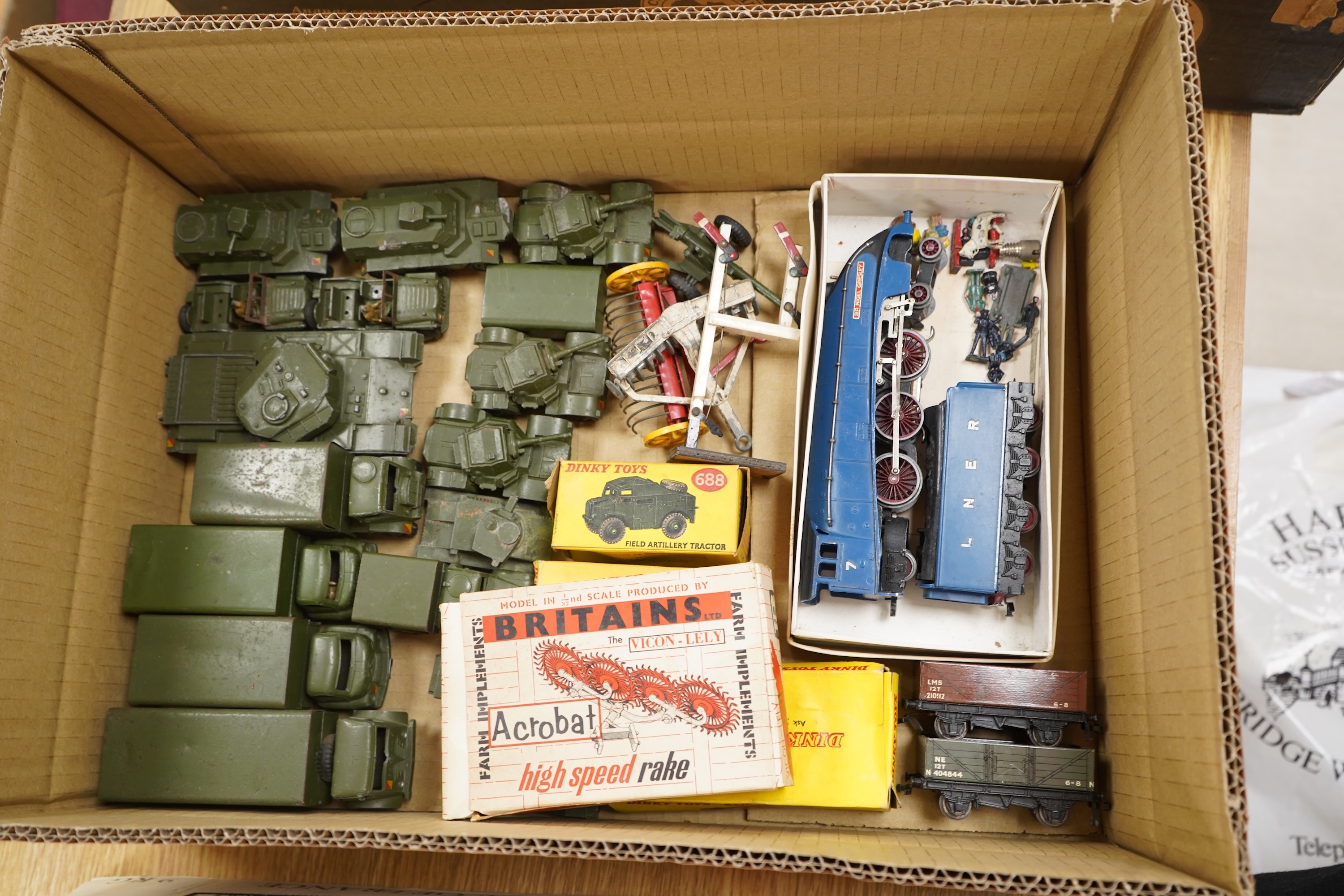 A quantity of Dinky Toys and Hornby Dublo including nineteen military Dinky and farm accessories (three boxed), plus a boxed Britains high speed rake complete with inner packing/display tray (9537)